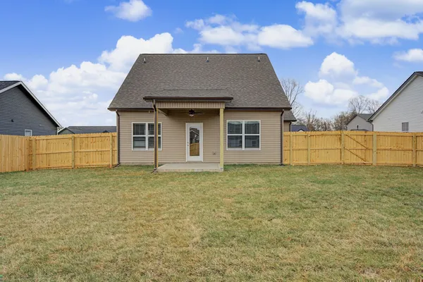 a house with yard in front of it