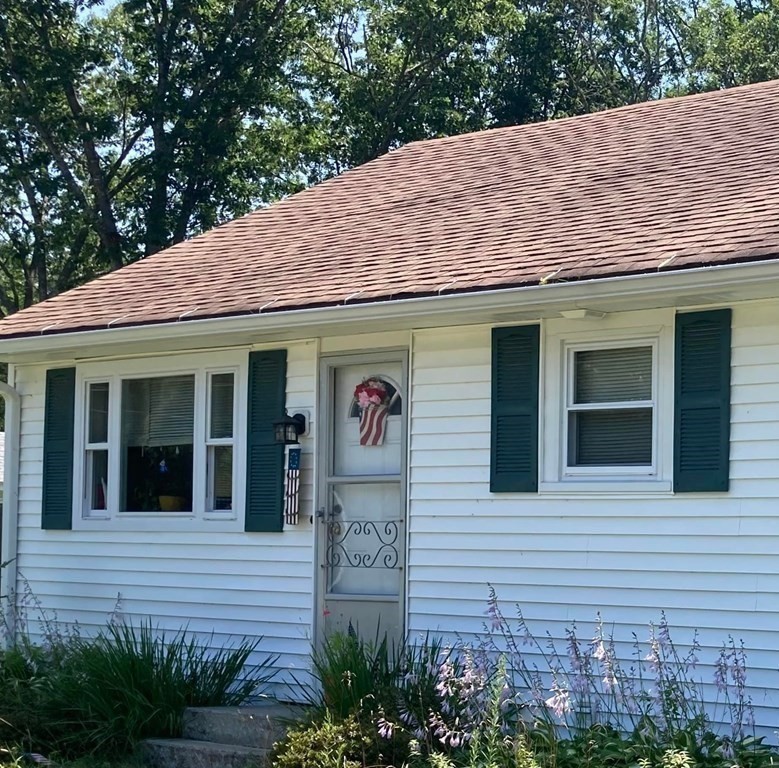 62 Lenox Circle Athol, MA 01331 - Photo 2 of 13 a front view of a house with garden