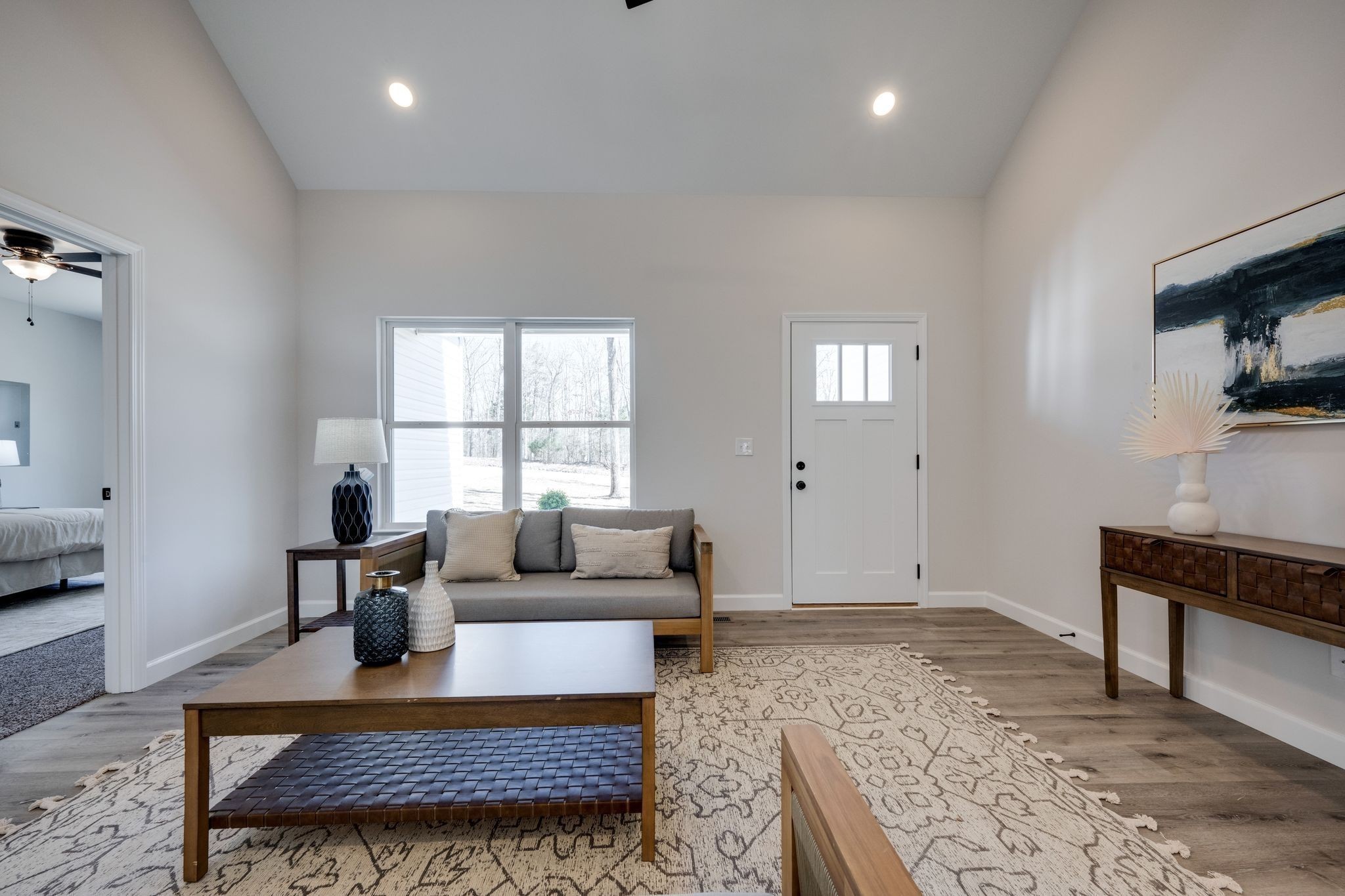 762 Billy Wynn Road Dickson, TN 37055 - Photo 12 of 38 a living room with furniture wooden floor and a fireplace