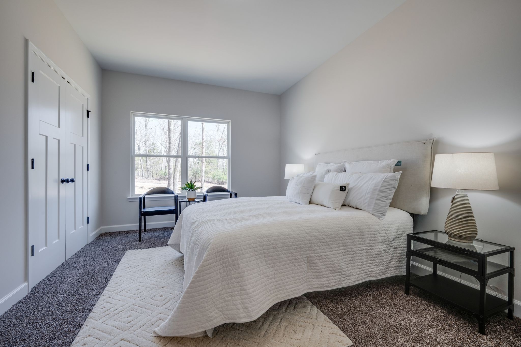 762 Billy Wynn Road Dickson, TN 37055 - Photo 26 of 38 a bedroom with a bed and a window