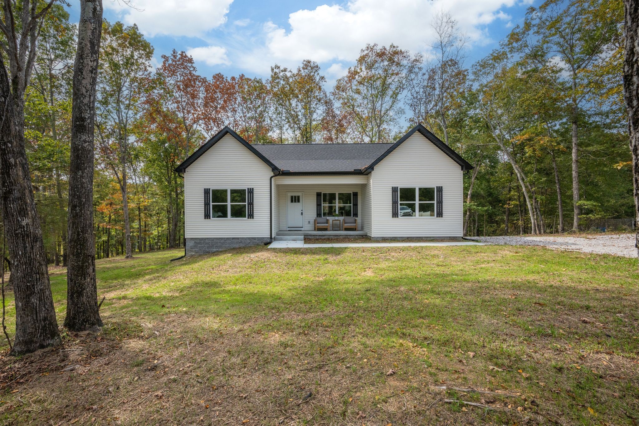 762 Billy Wynn Road Dickson, TN 37055 - Photo 3 of 38 a view of a house with a backyard
