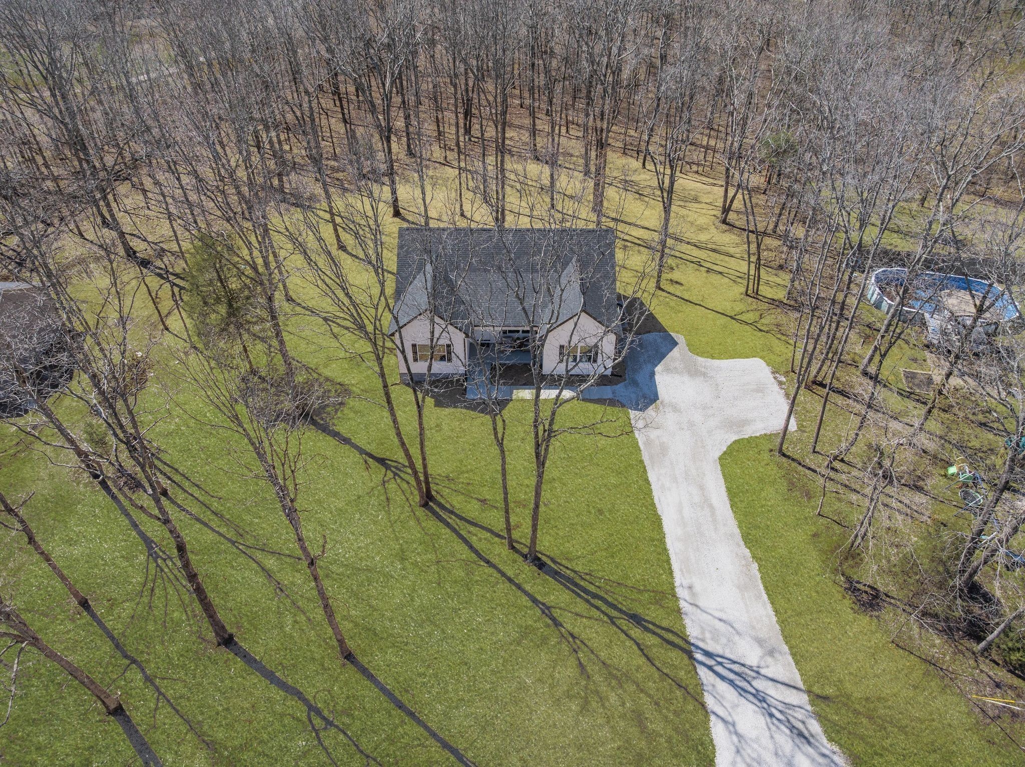762 Billy Wynn Road Dickson, TN 37055 - Photo 5 of 38 a view of a swimming pool with a yard
