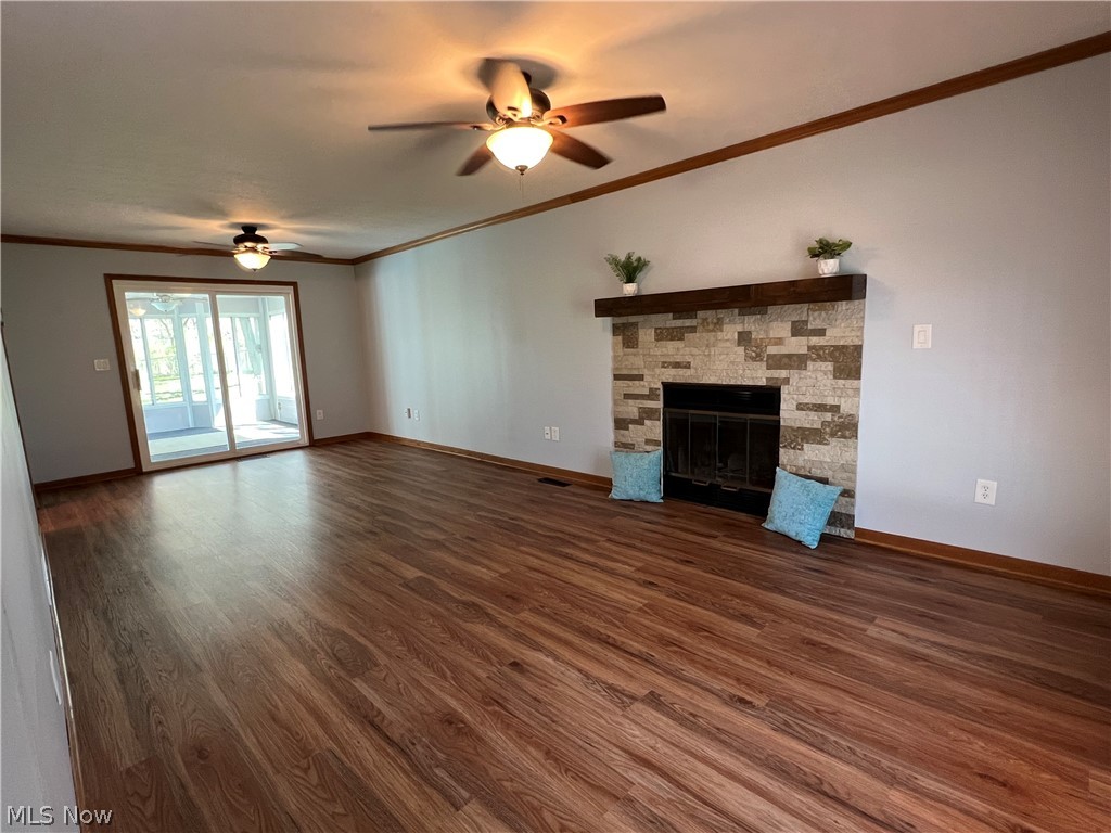 1283 Ritchie Road Stow, OH 44224 - Photo 2 of 31 Living Room with gas log-lighter fireplace. New LVP flooring