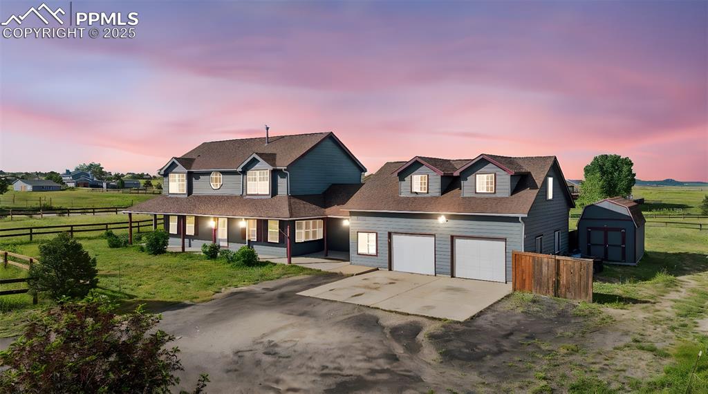 13490 Halleluiah Trail Elbert, CO 80106 - Photo 1 of 38 a front view of a house with a yard