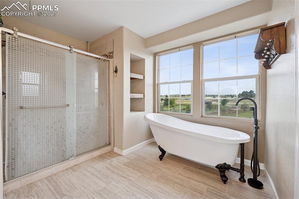13490 Halleluiah Trail Elbert, CO 80106 - Photo 19 of 38 a living room with furniture and a window