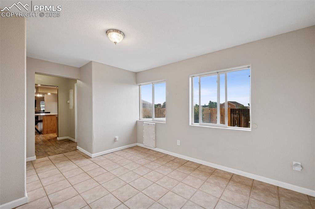 13490 Halleluiah Trail Elbert, CO 80106 - Photo 25 of 38 a view of a room with window and hardwood floor