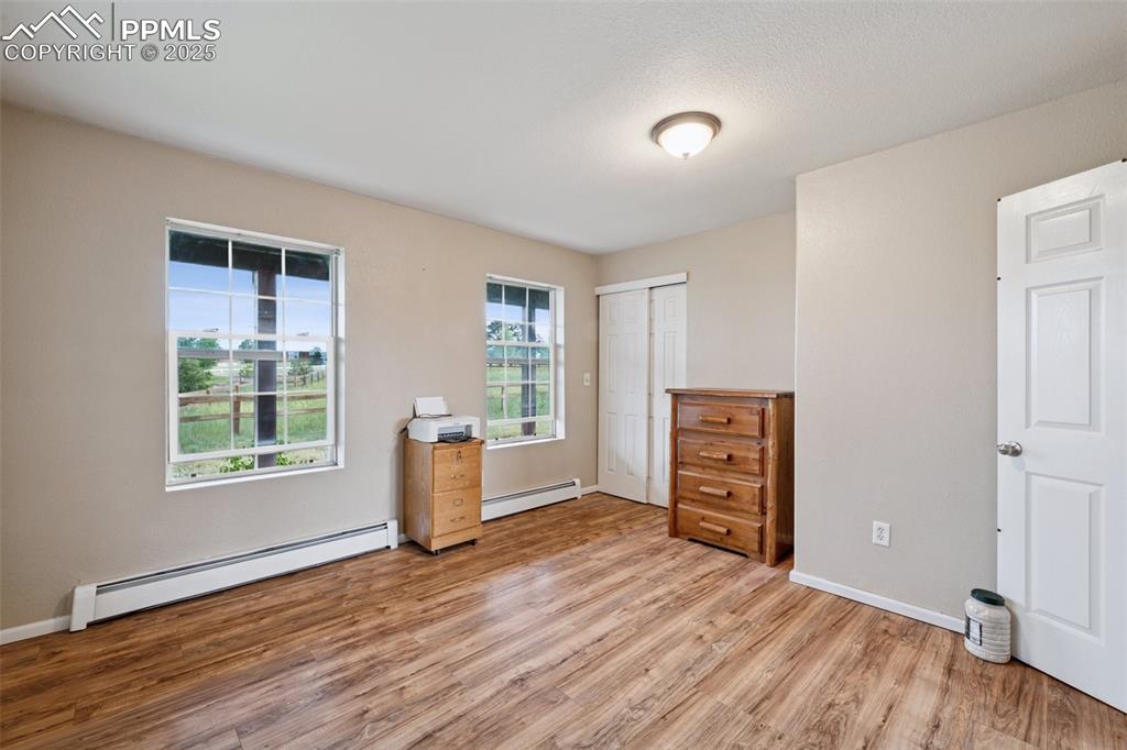 13490 Halleluiah Trail Elbert, CO 80106 - Photo 27 of 38 a view of a kitchen with furniture and wooden floor