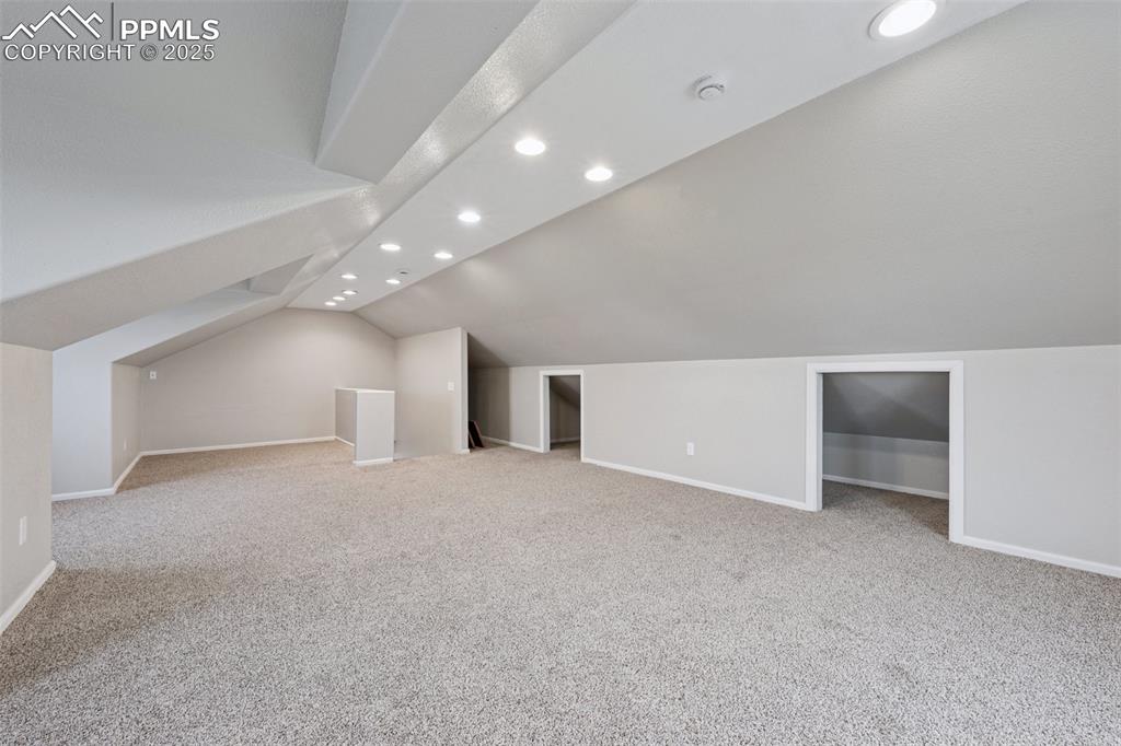 13490 Halleluiah Trail Elbert, CO 80106 - Photo 30 of 38 a view of an empty room with a fireplace