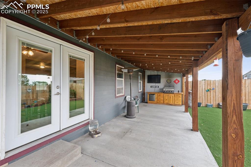 13490 Halleluiah Trail Elbert, CO 80106 - Photo 31 of 38 a view of a room with wooden floor and windows