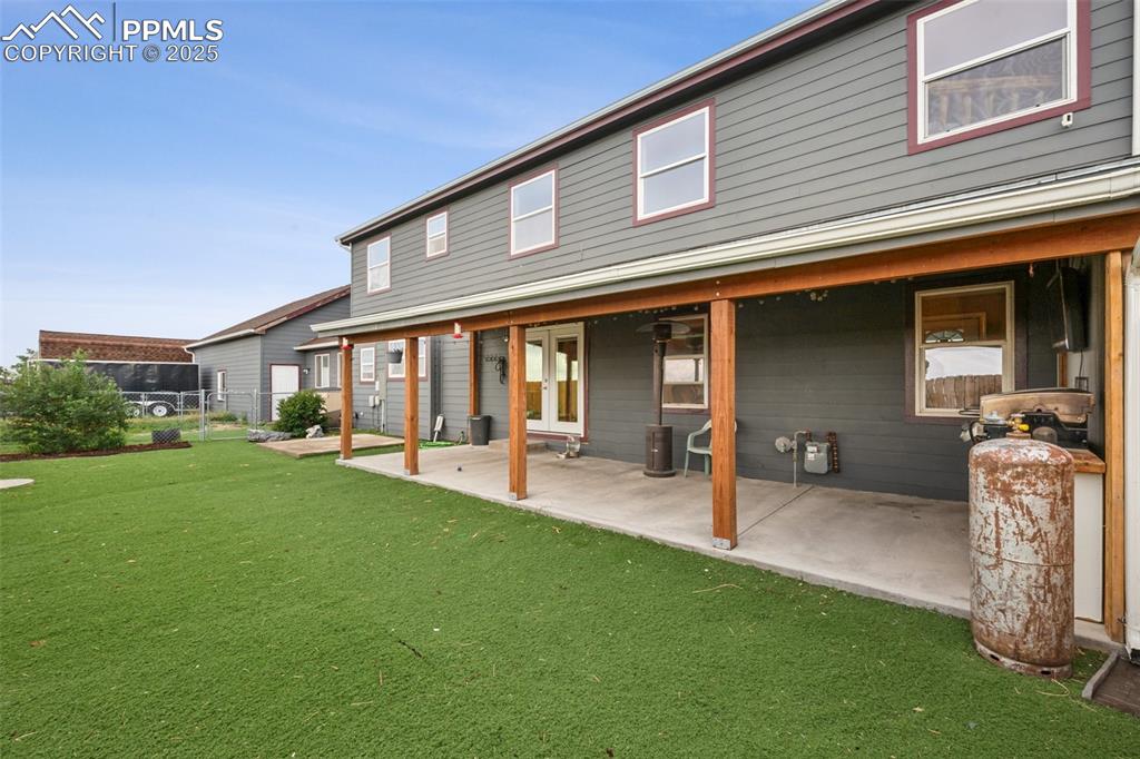 13490 Halleluiah Trail Elbert, CO 80106 - Photo 33 of 38 a view of a house with backyard porch and sitting area