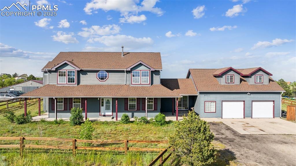 13490 Halleluiah Trail Elbert, CO 80106 - Photo 38 of 38 a front view of a house with garden