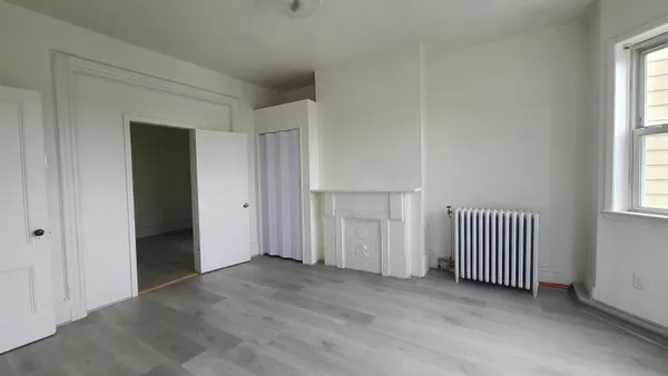 an empty room with windows