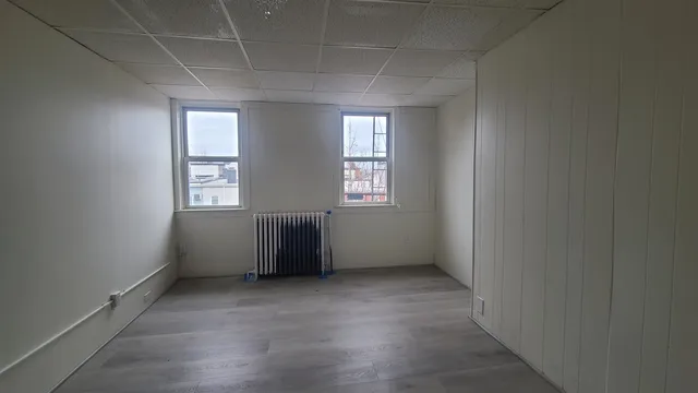 an empty room with windows