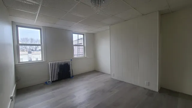 an empty room with windows