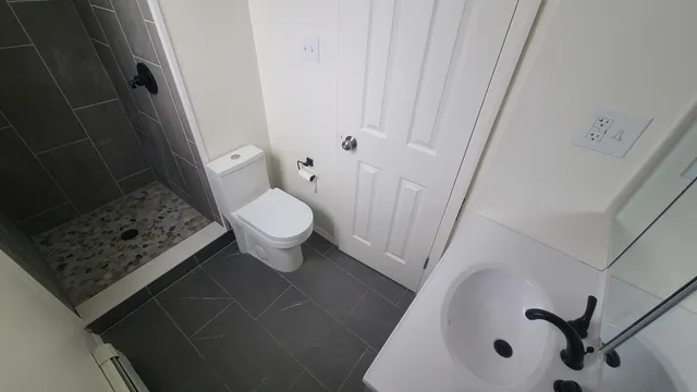 a bathroom with a sink and toilet