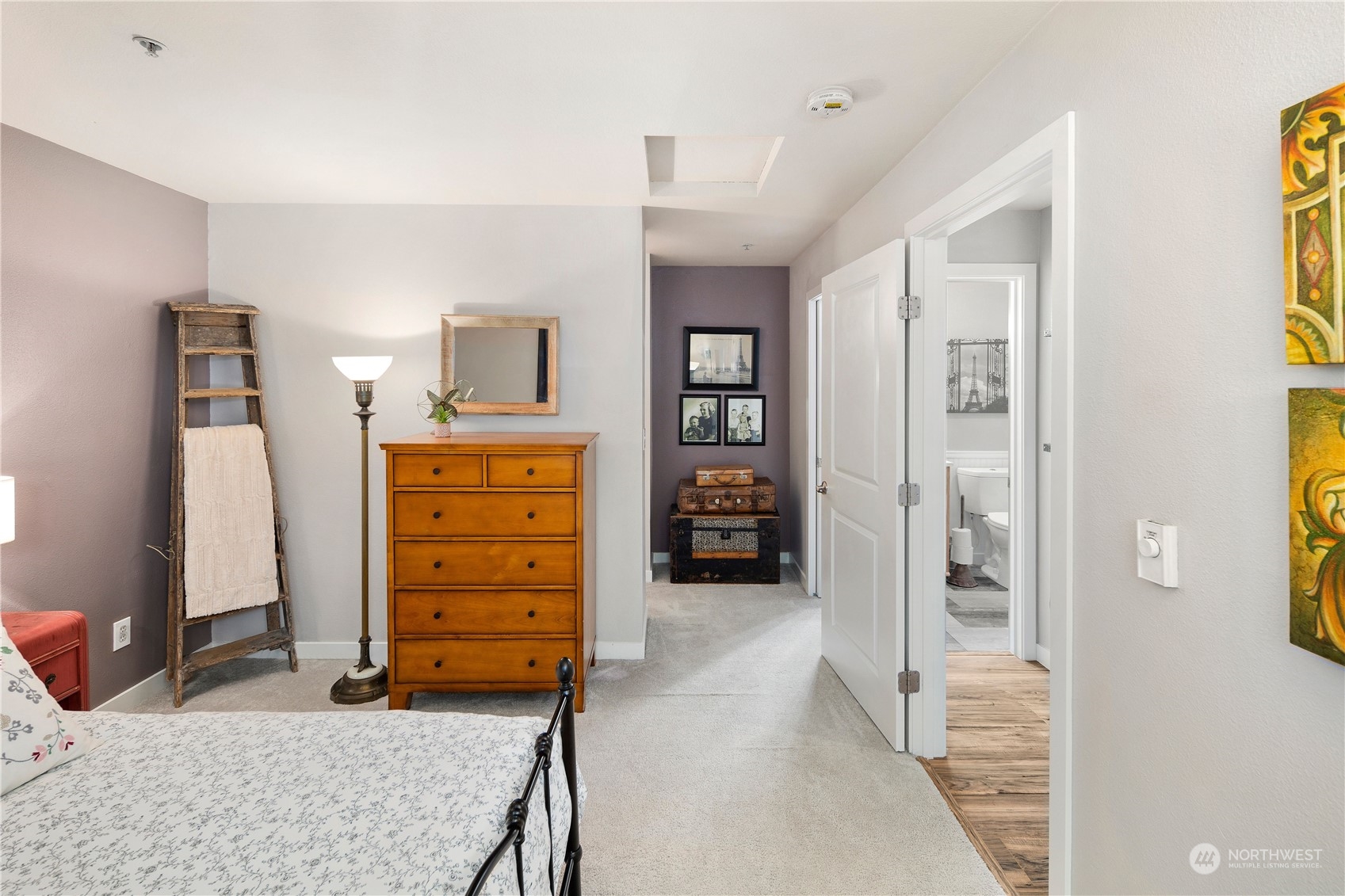 3914 243rd Place Southeast, Unit L401 Bothell, WA 98021 - Photo 18 of 25 a view of a bedroom with closet and cabinet