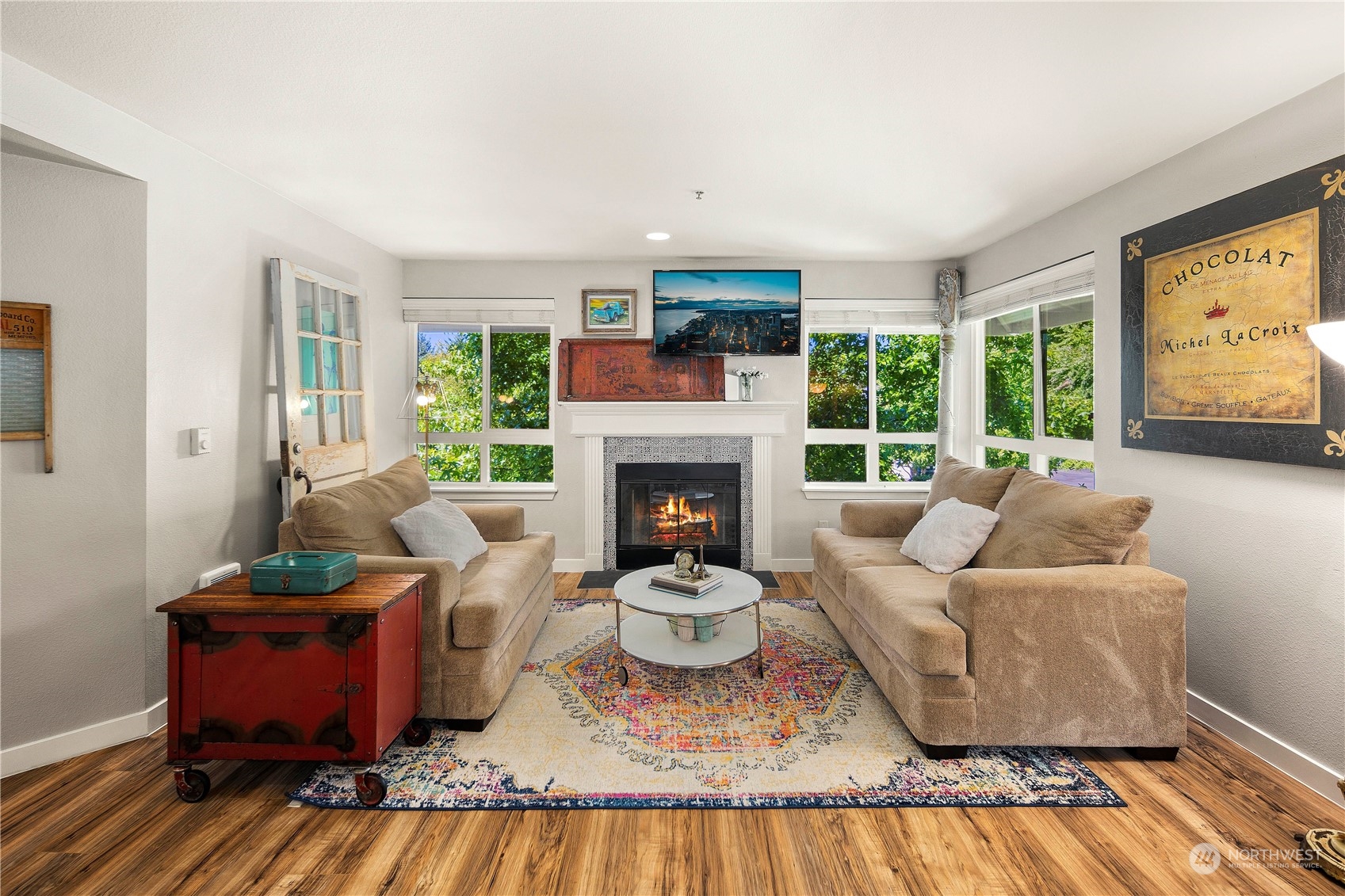 3914 243rd Place Southeast, Unit L401 Bothell, WA 98021 - Photo 4 of 25 a living room with furniture fireplace and window