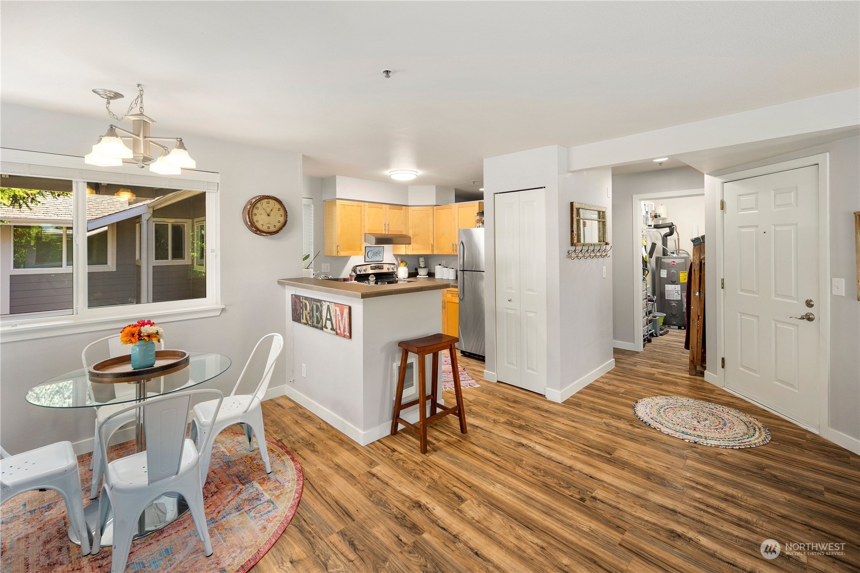 3914 243rd Place Southeast, Unit L401 Bothell, WA 98021 - Photo 6 of 25 a view of a kitchen and dining room