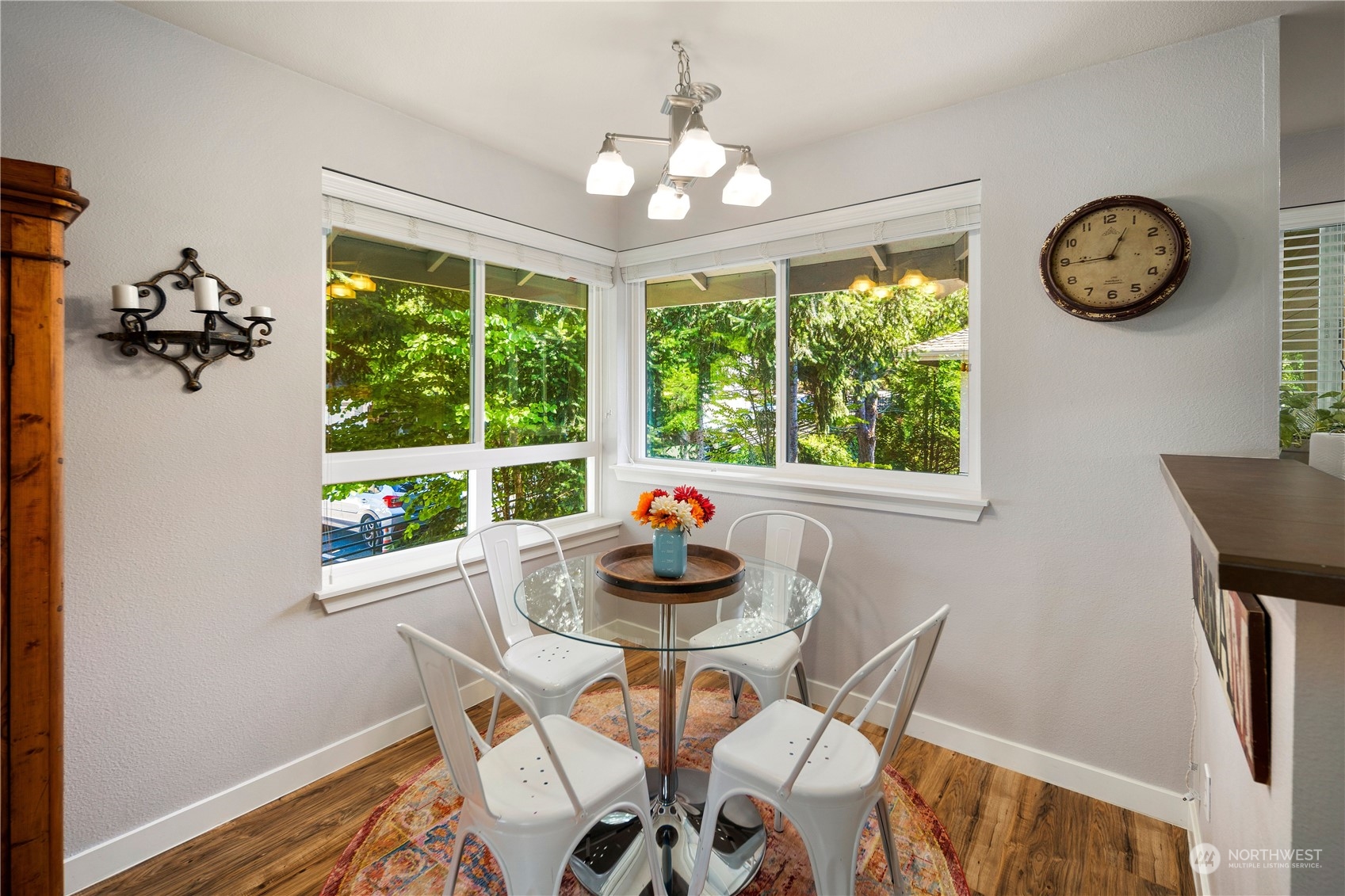 3914 243rd Place Southeast, Unit L401 Bothell, WA 98021 - Photo 10 of 25 a dining room with wooden floor and a window