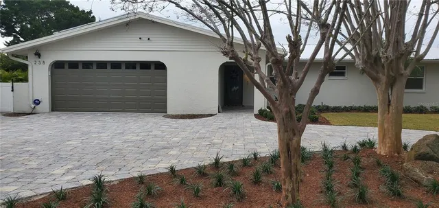 a view of swimming pool with a table and chairs