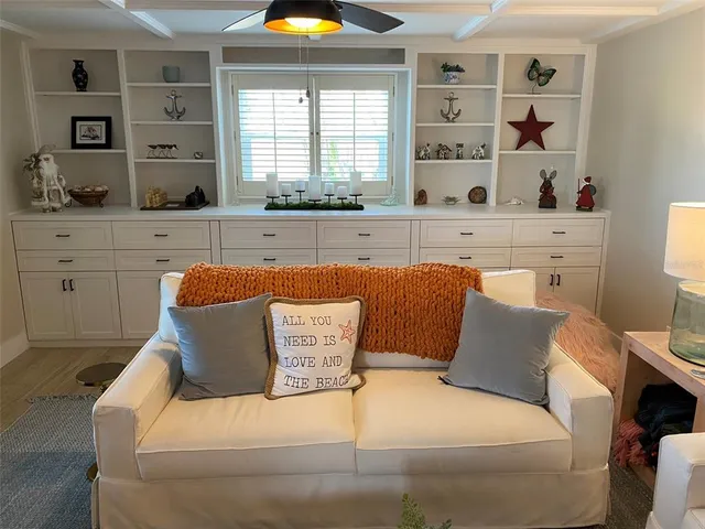 a kitchen with a refrigerator and a stove