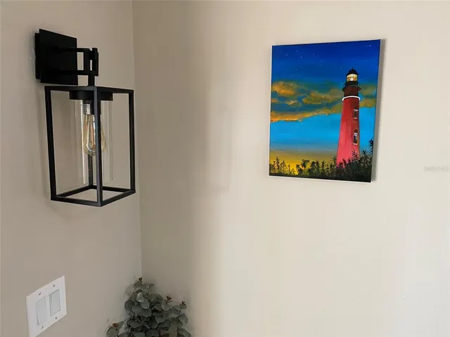 a view of a livingroom with furniture and closet