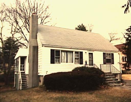 17 Chelene Road Norwalk, CT 06851 - Photo 1 of 1 a front view of a house with a yard