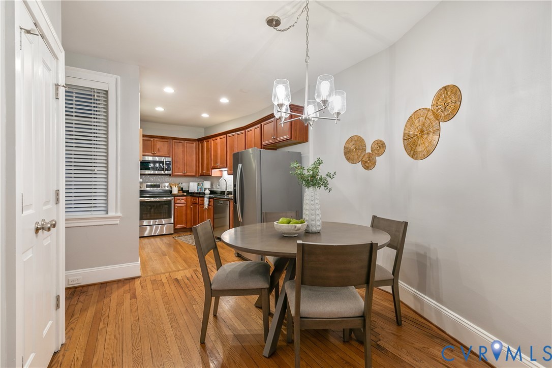 601 Roseneath Road, Unit U1 Richmond, VA 23221 - Photo 10 of 36 Hardwood flooring extends from the dining area int