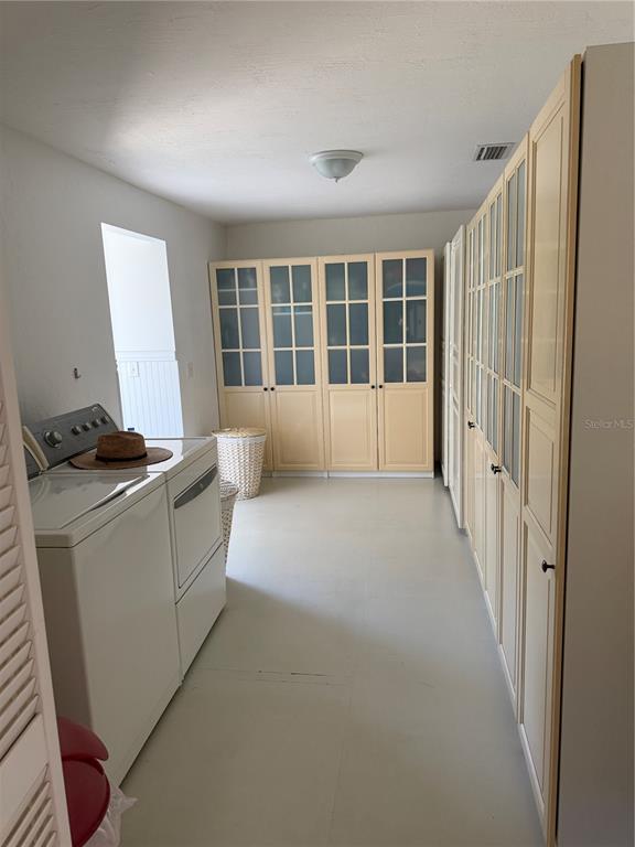7390 South Mc Alpin Road McAlpin, FL 32062 - Photo 11 of 53 a view of workspace with furniture and a window