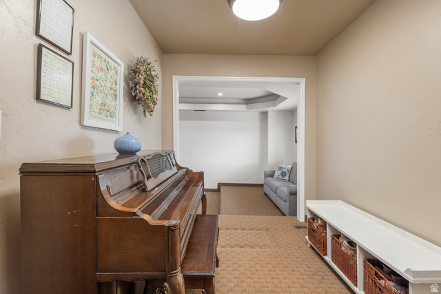 892 Cambridge Drive St. George, UT 84770 - Photo 8 of 65 Spacious hallway featuring neutral wall tones, textured carpeting, and recessed lighting