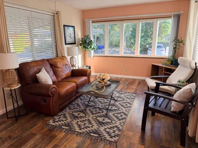 a room with water heater and wooden walls