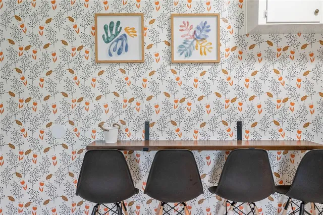 a view of outdoor space with wooden floor