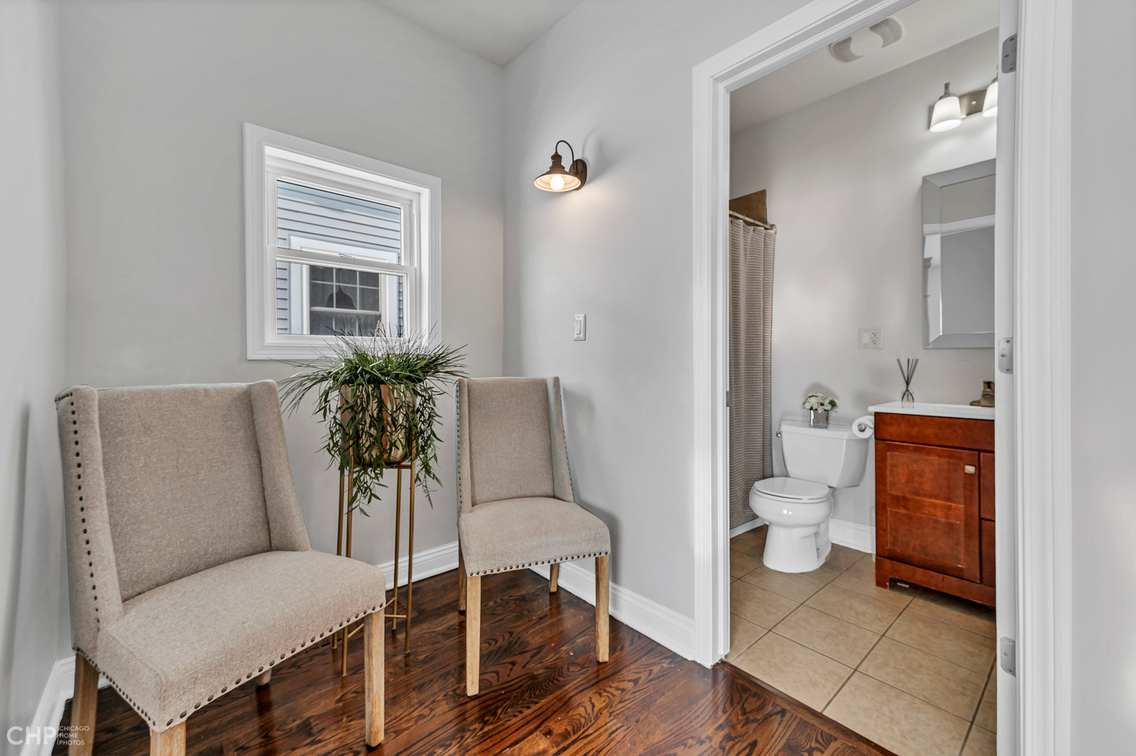 4841 West Berenice Avenue Chicago, IL 60641 - Photo 11 of 34 a living room with furniture and a window