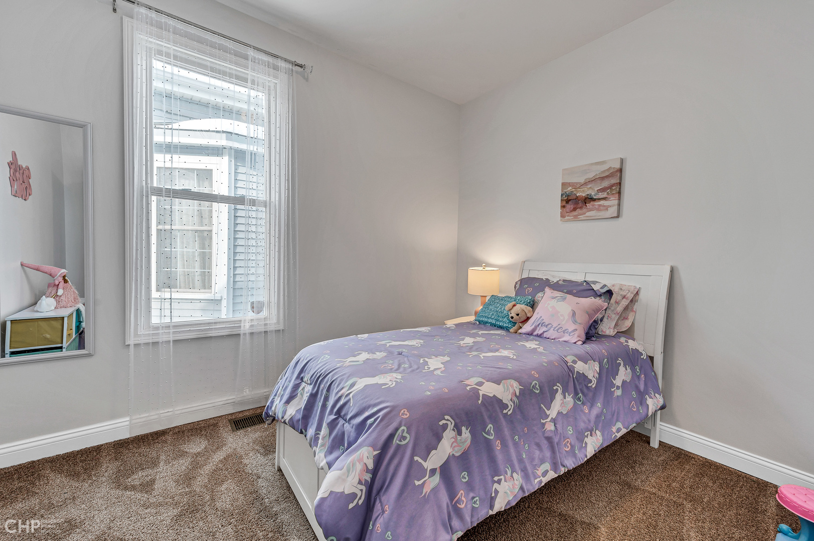 4841 West Berenice Avenue Chicago, IL 60641 - Photo 15 of 34 a bedroom with a bed and a window