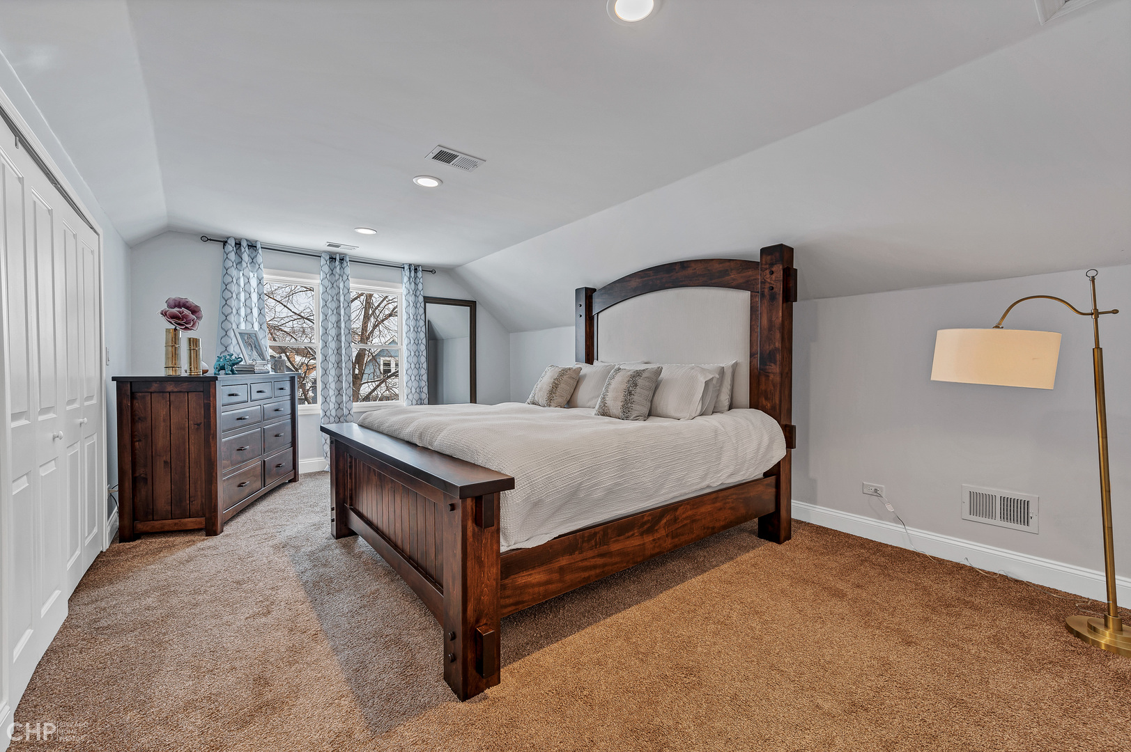 4841 West Berenice Avenue Chicago, IL 60641 - Photo 22 of 34 a bedroom with a bed and window