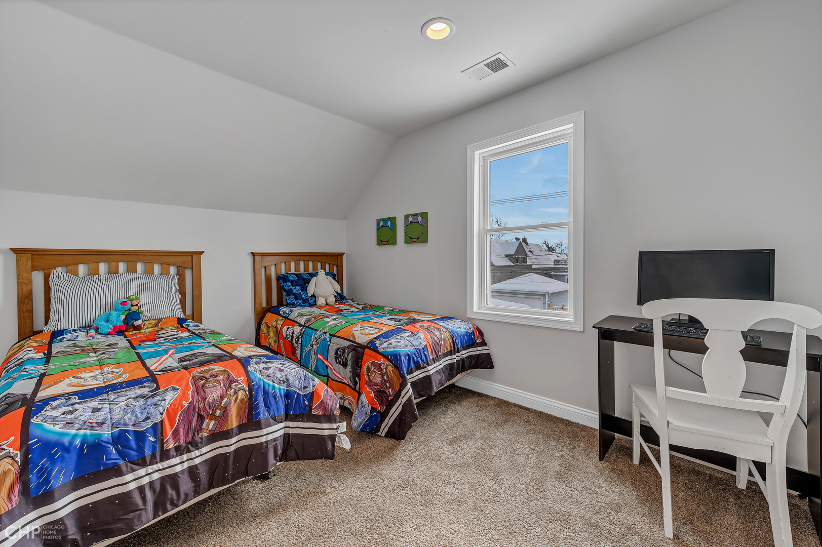 4841 West Berenice Avenue Chicago, IL 60641 - Photo 26 of 34 a bedroom with two beds and a chair