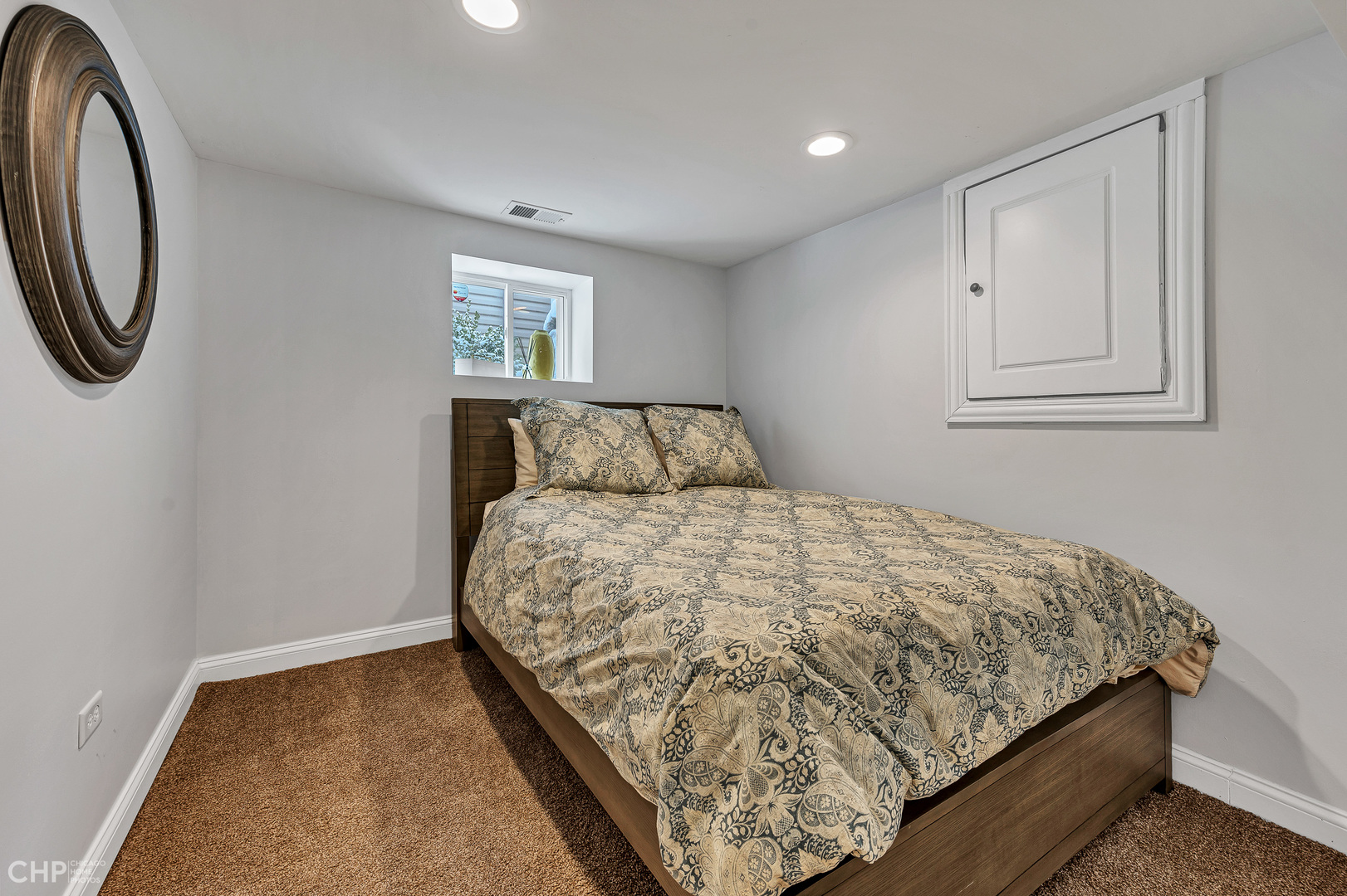 4841 West Berenice Avenue Chicago, IL 60641 - Photo 31 of 34 a bedroom with a bed and a window