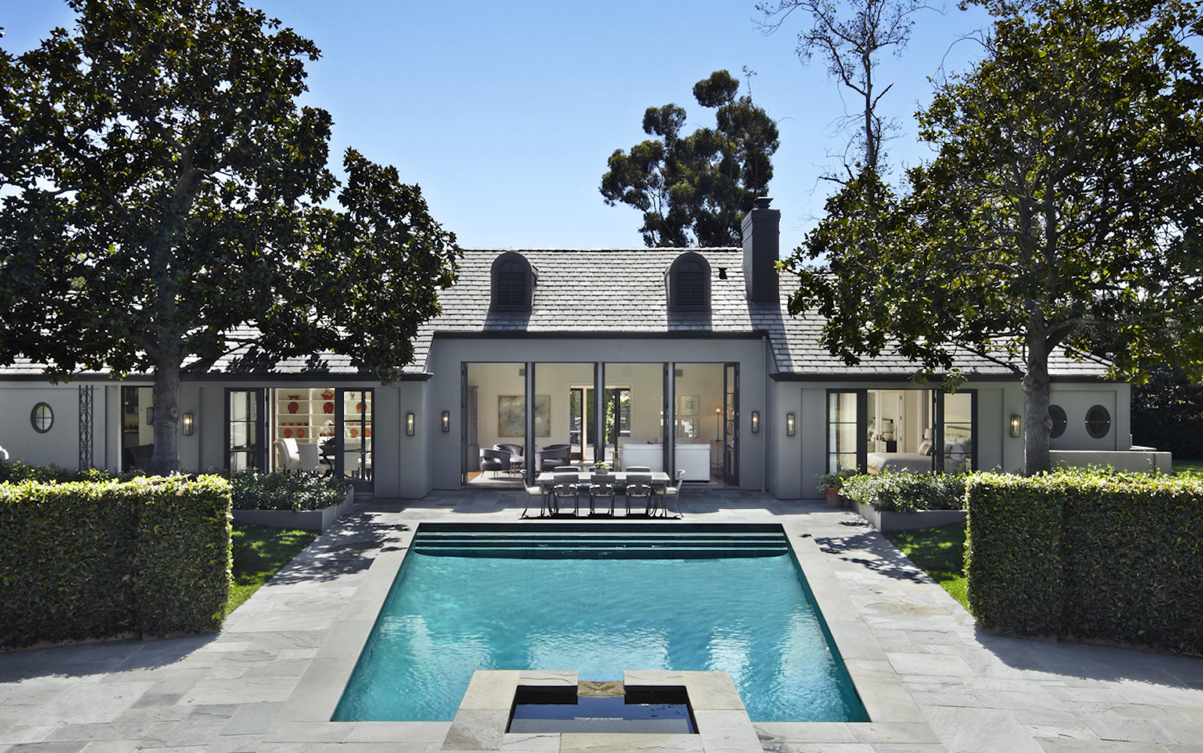 a view of a house with pool porch and furniture