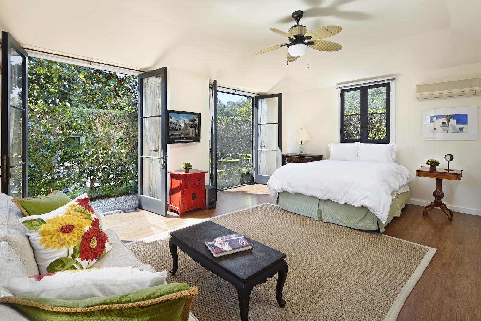 760 San Ysidro Road Santa Barbara, CA 93108 - Photo 11 of 12 a bedroom with a bed and a couch