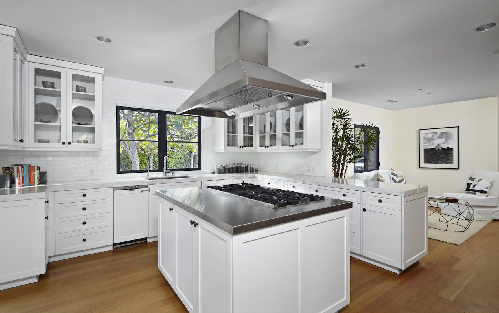760 San Ysidro Road Santa Barbara, CA 93108 - Photo 5 of 12 a kitchen that has a sink and a stove