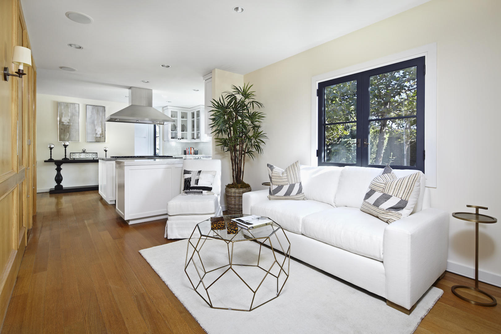 760 San Ysidro Road Santa Barbara, CA 93108 - Photo 6 of 12 a living room with furniture a dining table and a large window