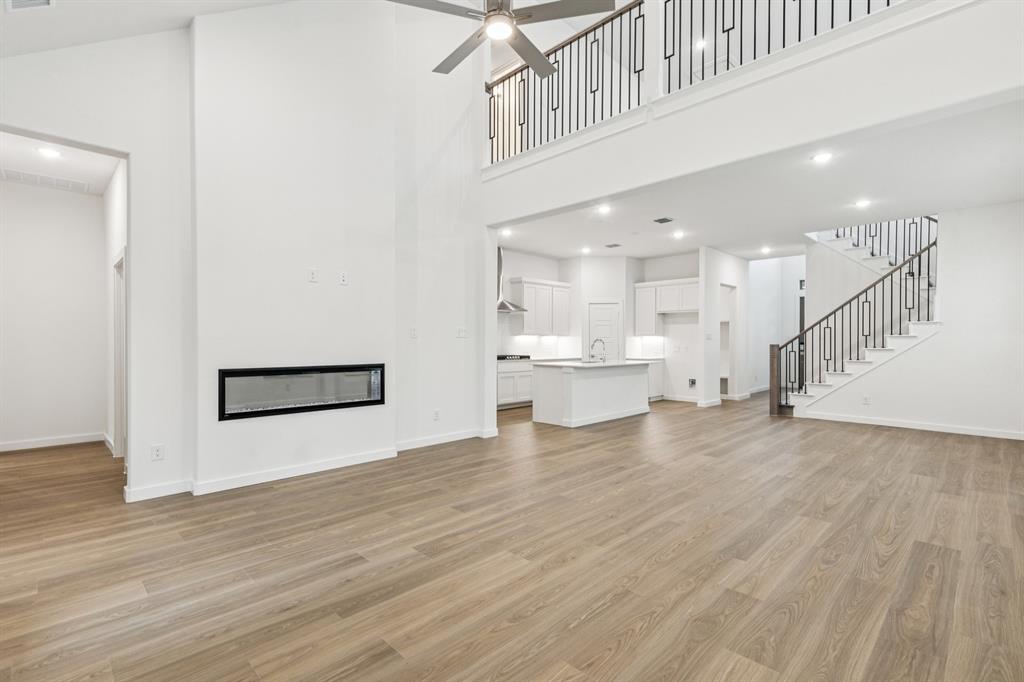 1900 Palmetto Road Celina, TX 75009 - Photo 15 of 33 Living Room in the Picasso II home plan by Trophy Signature Homes – REPRESENTATIVE PHOTO