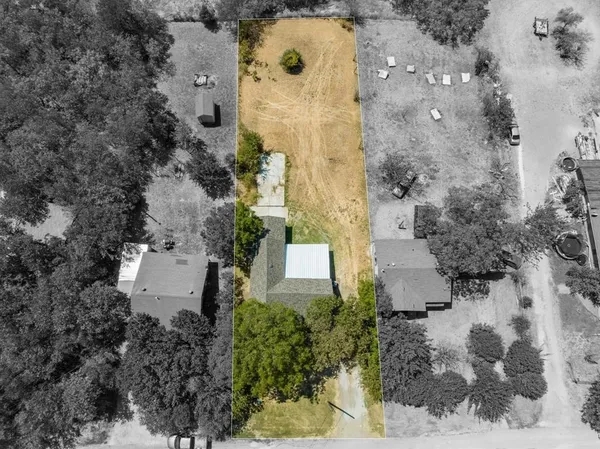 an aerial view of residential house with outdoor space