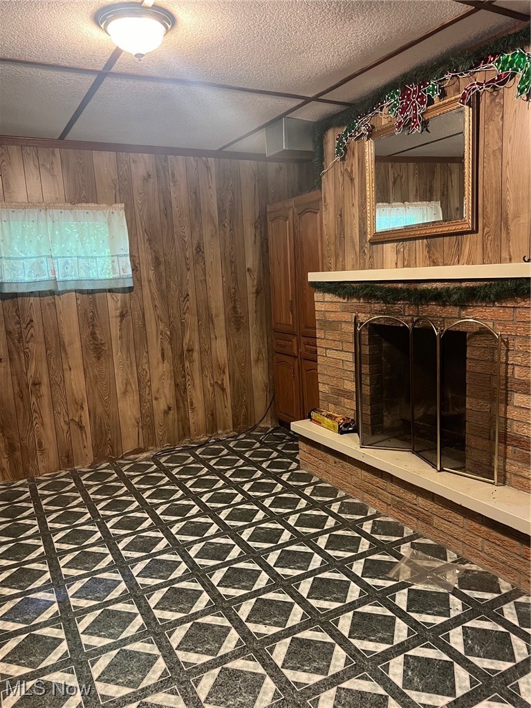 10504 Mulberry Road Chardon, OH 44024 - Photo 23 of 23 Basement rec room with a brick fireplace