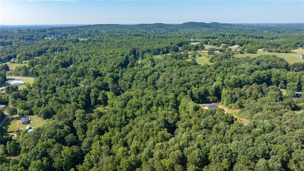 3 Cantrell Road Cumming, GA 30041 - Photo 5 of 7 an aerial view of residential houses with outdoor space and trees
