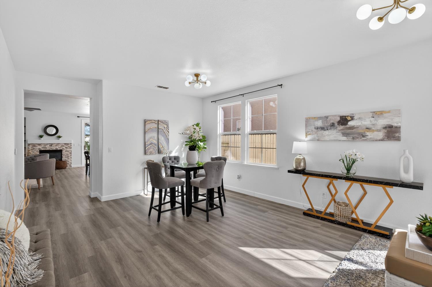 6217 Jefjen Way Elk Grove, CA 95757 - Photo 13 of 58 a view of a dining room with furniture and wooden floor