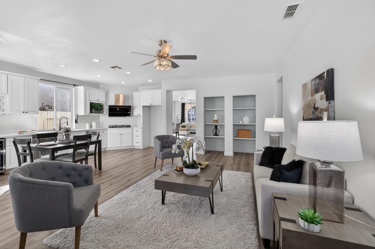 6217 Jefjen Way Elk Grove, CA 95757 - Photo 15 of 58 a living room with furniture and a view of kitchen