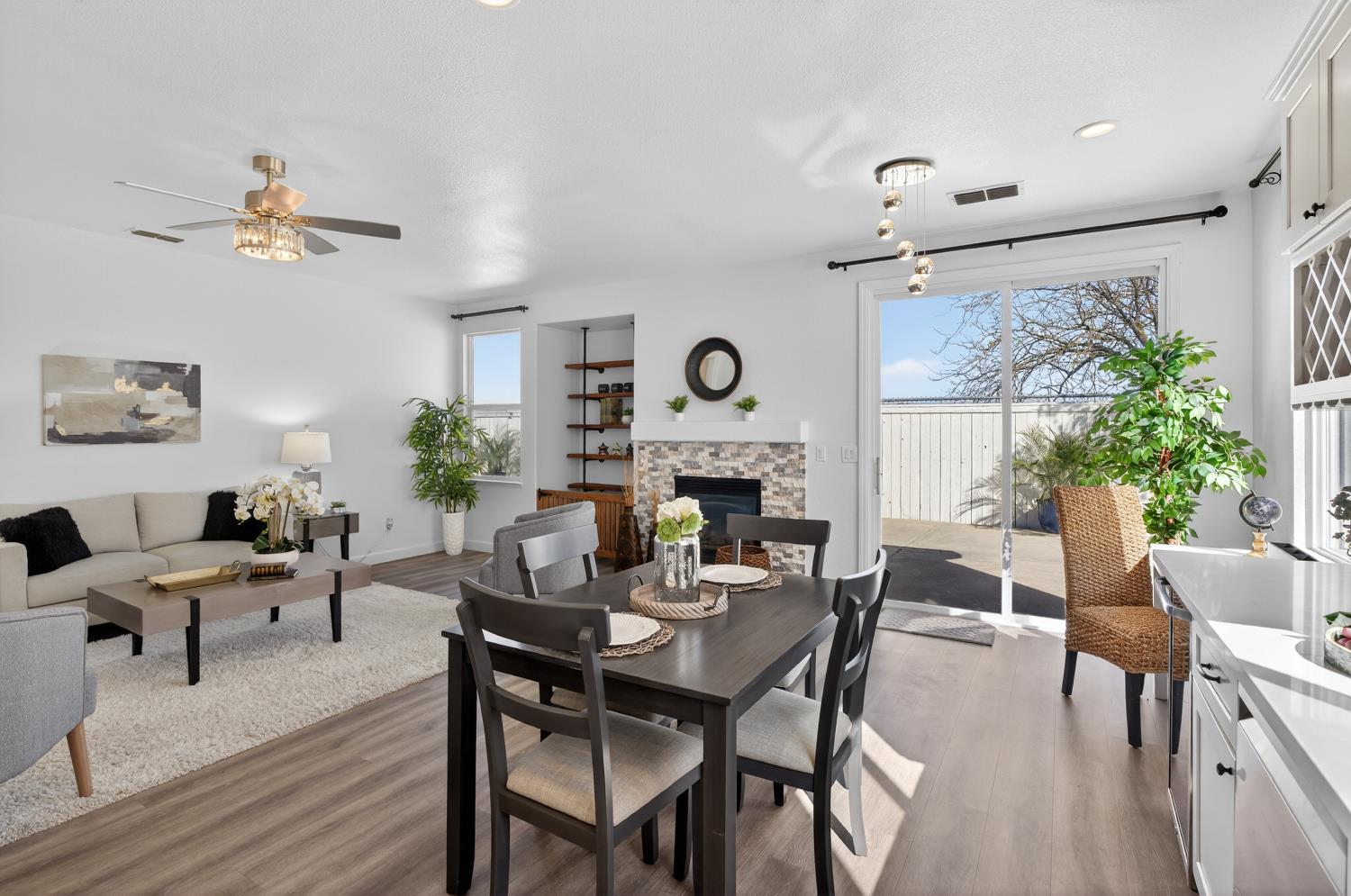 6217 Jefjen Way Elk Grove, CA 95757 - Photo 24 of 58 a view of a dining room with furniture window and wooden floor