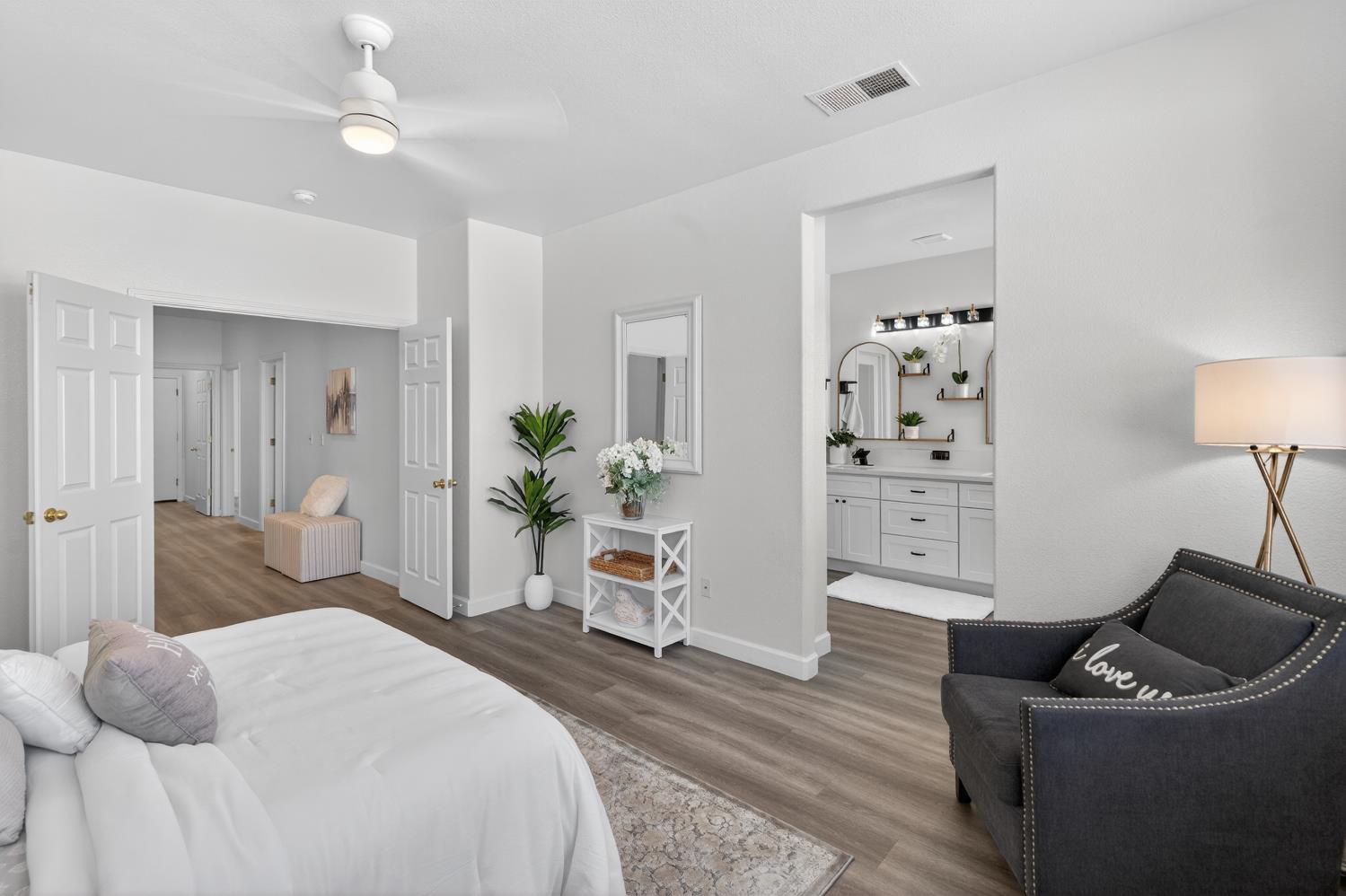 6217 Jefjen Way Elk Grove, CA 95757 - Photo 37 of 58 a bedroom with a bed and ceiling fan