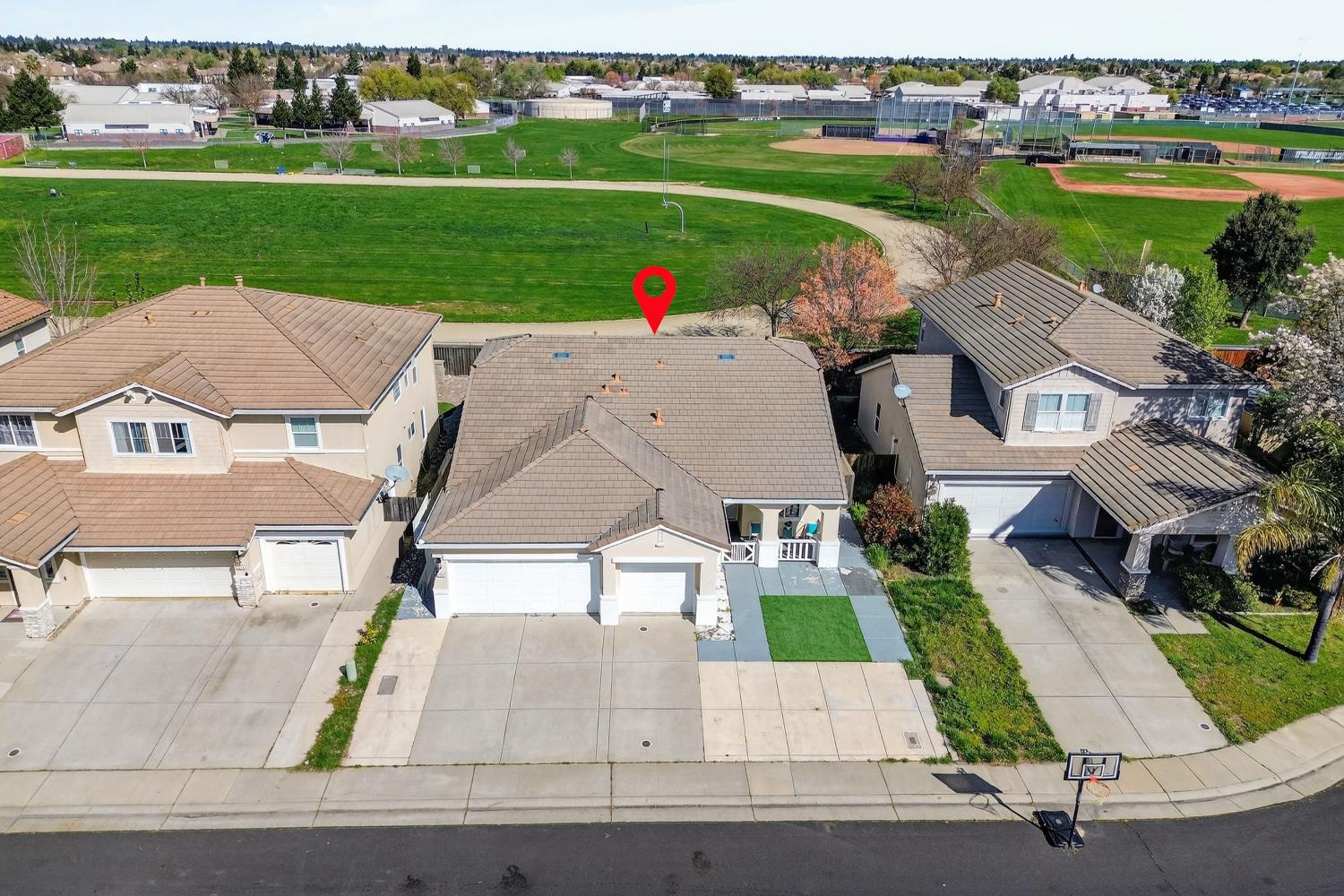 6217 Jefjen Way Elk Grove, CA 95757 - Photo 51 of 58 an aerial view of a house with a yard and lake view